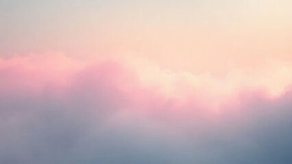 Soft, serene landscape of pastel-colored clouds at sunrise or sunset with a gradient of pink, orange, and purple hues in the sky.