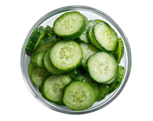 Round glass bowl filled with fresh, sliced green cucumbers viewed from above