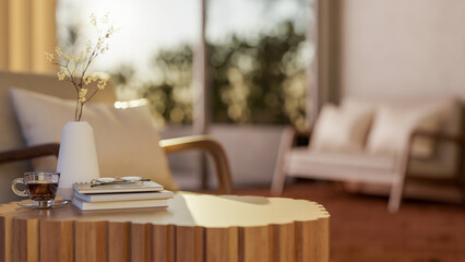 Coffee cup with books and vase on wooden table and chair with sunlight through window in living room