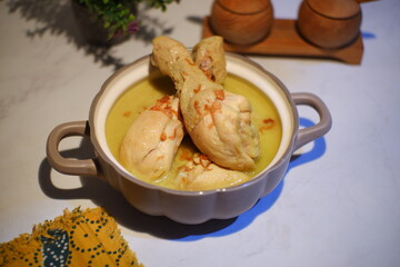 chicken cooked in coconut sauce