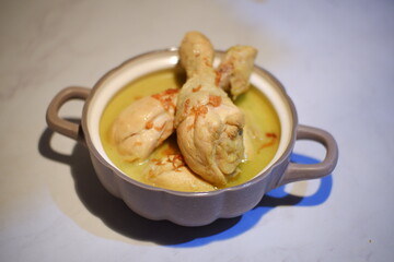 chicken cooked in coconut milk or opor ayam 