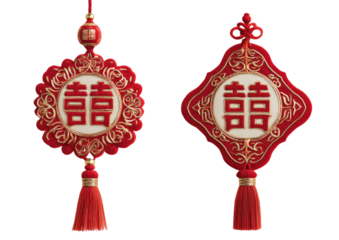 Ornate, red hanging decorations, circular and diamond shaped on black