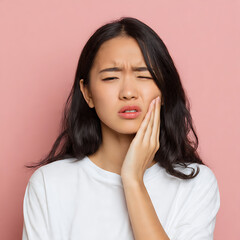 Face expression suffering from sensitive teeth, Asian young woman touching cheek