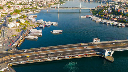 Istanbul, Turkey. Golden Horn Metro Bridge and Halic Station aerial drone view in morning sunlight. Aerial View