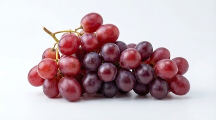 Fototapeta premium A close up view of a cluster of plump reddish purple grapes rests against a clean white background showcasing their natural beauty