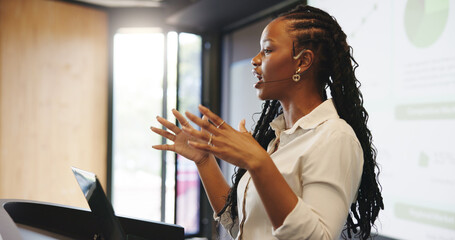 Presentation, speaking or woman with tech at podium, company stats or performance data review. Space, pc or African presenter with mic for info analysis, explain charts or graphs for business seminar