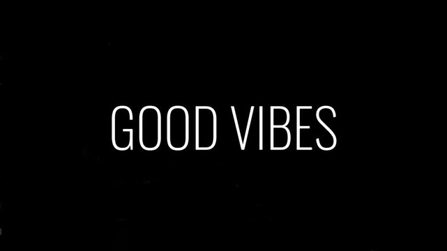 A minimalist graphic design featuring the uplifting phrase "Good Vibes" in a clear, modern white font against a stark black background, conveying a message of positivity and well-being