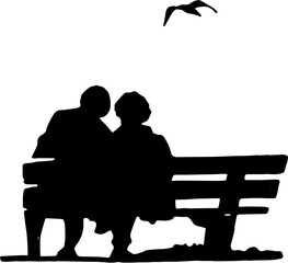 Silhouette of an elderly couple sitting on a park bench looking at a flying bird