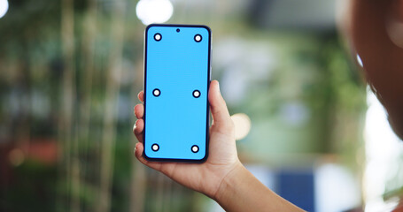 Hand, green screen and woman with smartphone, internet or online reading with notification. Closeup, mobile user or person with cellphone, email alert or subscription for social media or mockup space