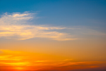 Fototapeta premium Enjoy a panoramic view of the skyline. The sun rises in the morning sky with colorful clouds. and beautiful cloud patterns In the soft light of the morning 