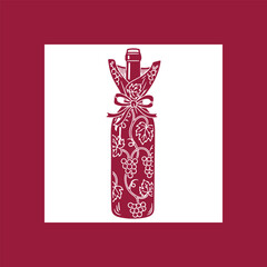Wine bottle elegantly wrapped with grape vine pattern and bow