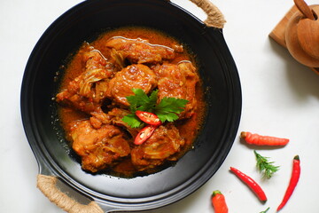 Spicy chicken curry in a plate 