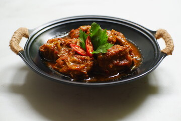 Spicy chicken stew in a plate