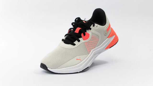 Beautiful new Puma sneakers on white background, close up. Yogyakarta, Indonesia, December 19, 2024