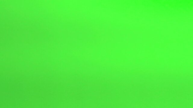Close up of gun shot action on chromakey with smoke and hand movement