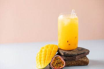 Homemade mango passion fruit lemonade in  glass . Summer refreshment cool drink