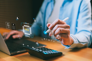 AI-powered tax e-filing and fintech automation concept with digital interface, calculator, and laptop. Smart tax compliance, accounting technology, and financial intelligence.