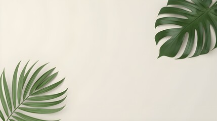 Minimal beige background with tropical green leaves creating a clean natural scene for modern design layouts