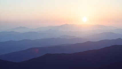 Sunset over layered mountain range with vibrant sky
