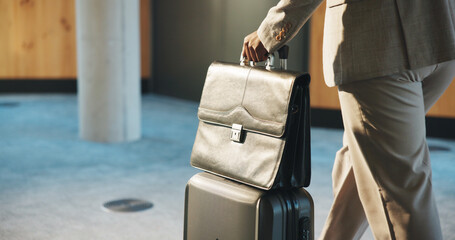 Hand, business man and luggage for work travel, corporate conference or walking in lobby for...