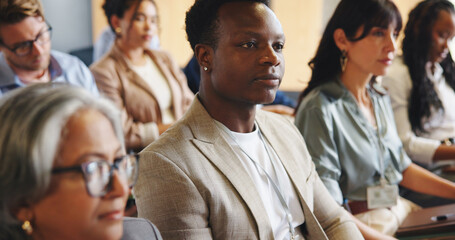 Businessman, audience and listening at conference with workshop, expo or presentation for career...