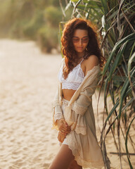 Sensual Boho Beach Portrait Of Curly Haired Woman In White Lace Outfit