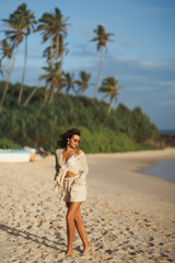 Tanned Caucasian Woman Posing on Tropical Beach at Sunset in Sri Lanka