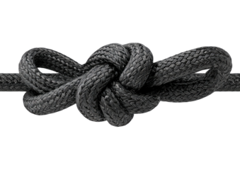 Intricate knot tied in thick, dark gray rope; centered on a dark background