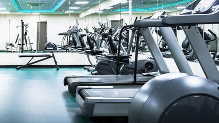 Fitness center with multiple treadmills and exercise equipment in clear view