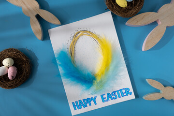 Handmade greeting card with EASTER eggs HAPPY EASTER written in beautiful handwriting. Gesture shows excitement and joy for the upcoming event. Springtime holiday gift present zero cost ideas