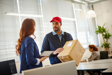 Delivery man, box and shipping with people in office for company supplier, logistics and digital signature. Supply chain, online shopping and package with employee in agency for courier and tablet