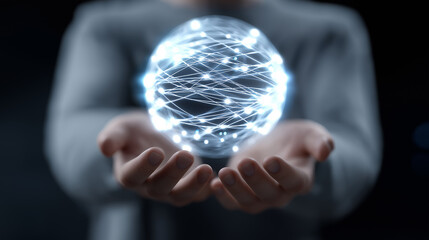 Glowing digital sphere held in human hands, symbolizing artificial intelligence, data connectivity, and advanced technological intelligence.
