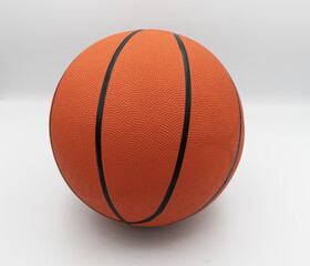 Fototapeta premium Basketball ball isolated on white background, orange sports equipment close up