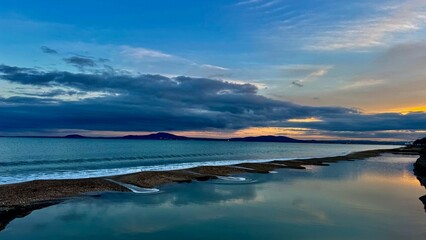 Fototapeta premium Dramatic Sunrise Over the Sea