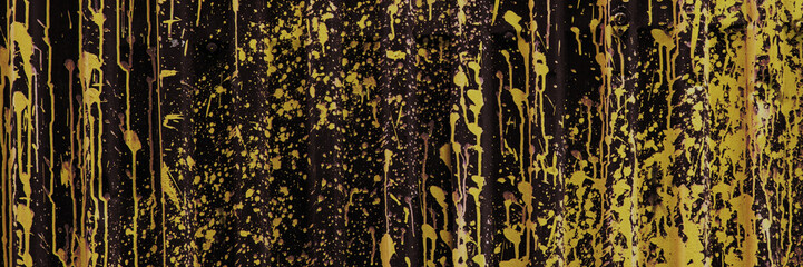 Gold Or Bronze Paint Splatter on Dark Corrugated Metal Background. Abstract surface.