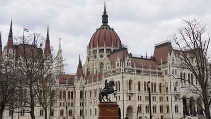 Obraz premium Architecture detail of the ornate neo-gothic Hungarian Parliament building. Located on the banks of the Danube River, in the center of Budapest