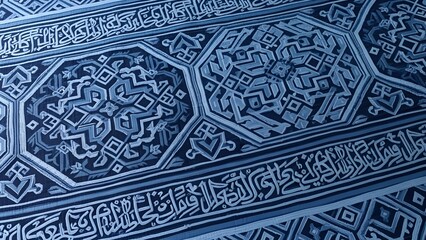 Intricate Geometric Patterns in Blue and White Islamic Art and Architecture