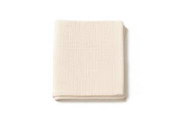 Folded cream cotton blanket on transparent background