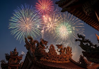 Colorful Chinese New Year pyrotechnics display with red and blue fireworks exploding over the traditional Chinese rooftops a night festival celebration