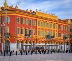 Ornate colorful buildings in Place Massena in Nice, French Riviera, France