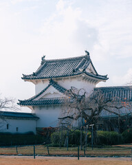 Naklejka premium Himeji Castle, a famous world heritage building in a sunny day.