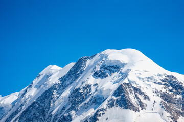 Aerial drone shot flying over the iconic Matterhorn in Switzerland. 