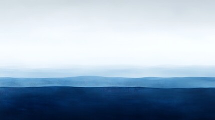 Fototapeta premium Harmonic Horizon: The image features a serene expanse of layered blue hues, suggestive of a vast ocean merging seamlessly with an ethereal sky.