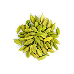 Green cardamom pods arranged in a circular pattern on white background