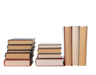 Stacked books, three piles, different heights, old