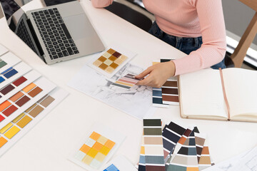 Creative web designer planning UI application and developing digital template