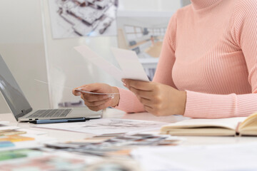 Creative web designer planning UI application and developing digital template