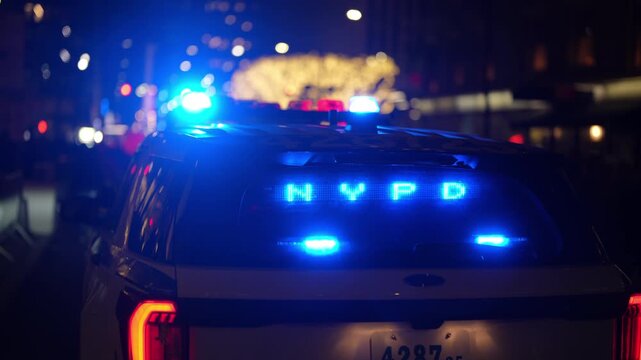 New York City Police Department, NYPD. Urban police patrol. Crime prevention department. Public safety law. Blue lights flashing. Police vehicle urban. American law enforcement. City police patrol.