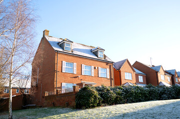 Roofs covered with snow. Sunny and cold day. High quality photo