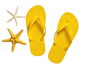 Yellow flip-flops with starfish on black backdrop